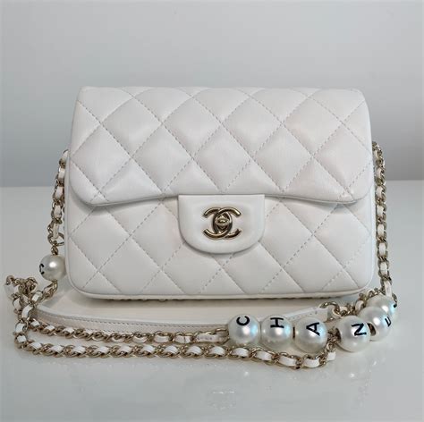 chanel giant pearl bag|Chanel bag with pearls strap.